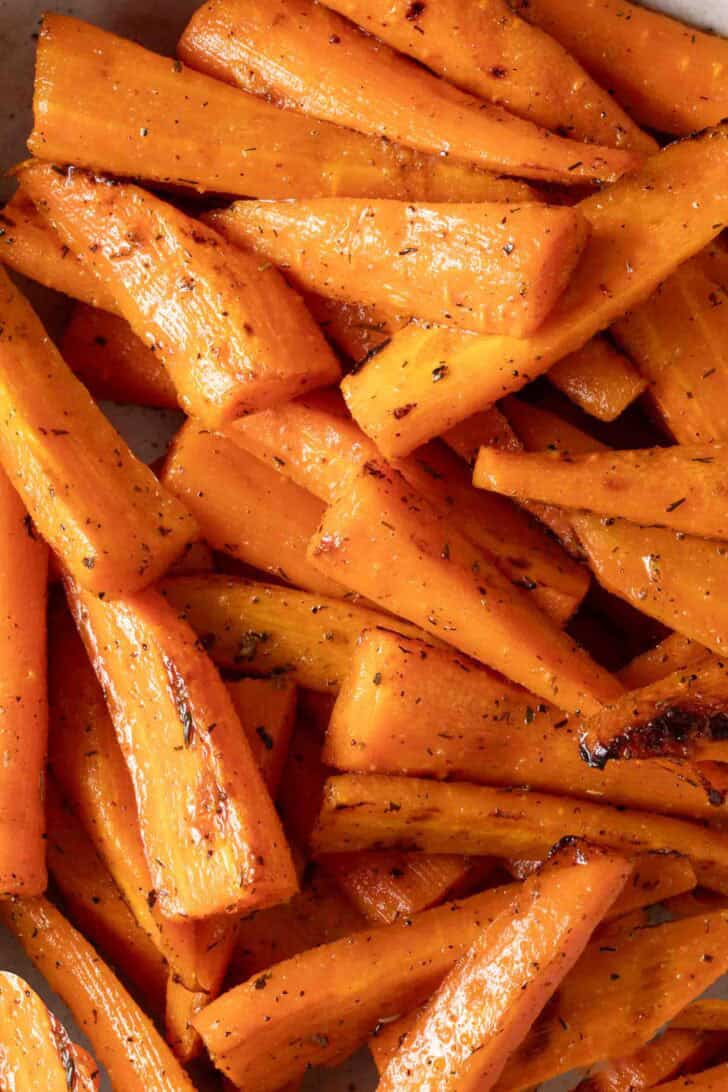 Roasted Carrots in Oven Roasted Carrots in a bowl.