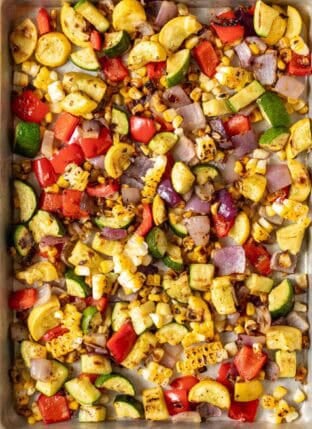 Roasted Summer Vegetables on a sheet pan.