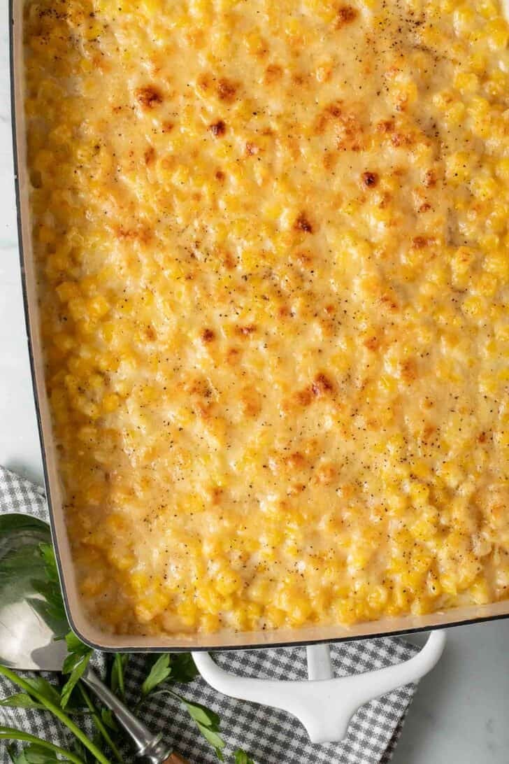 Cream Corn Recipe Cream Corn in a white baking dish.