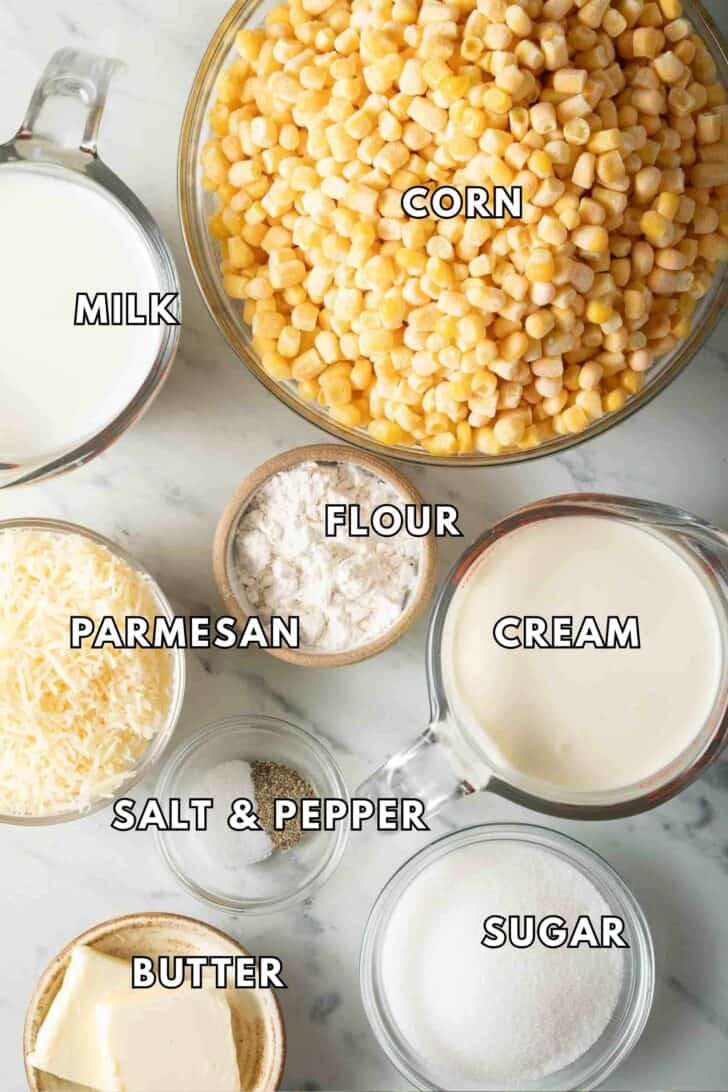 Creamed Corn Recipe Clear glass bowls filled with frozen corn, milk, cream, Parmesan cheese, and sugar for creamed corn recipe.
