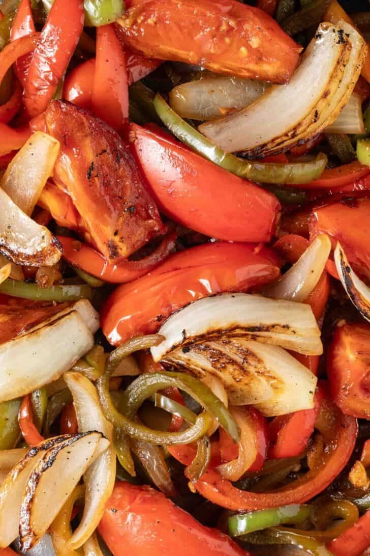 How to Make Fajita Vegetables Fajita Vegetables in a cast iron skillet.