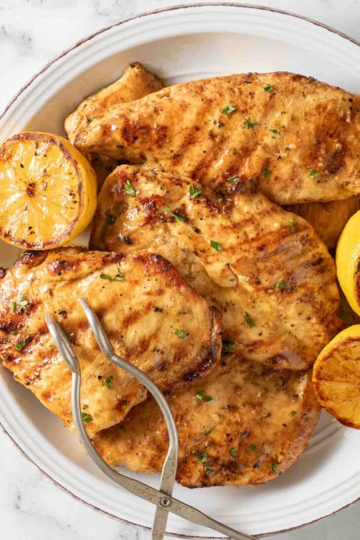 Grilled Lemon Chicken Grilled Lemon Chicken on a plate.