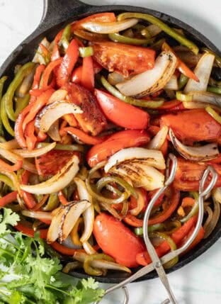 Fajita Veggies in a cast iron skillet.