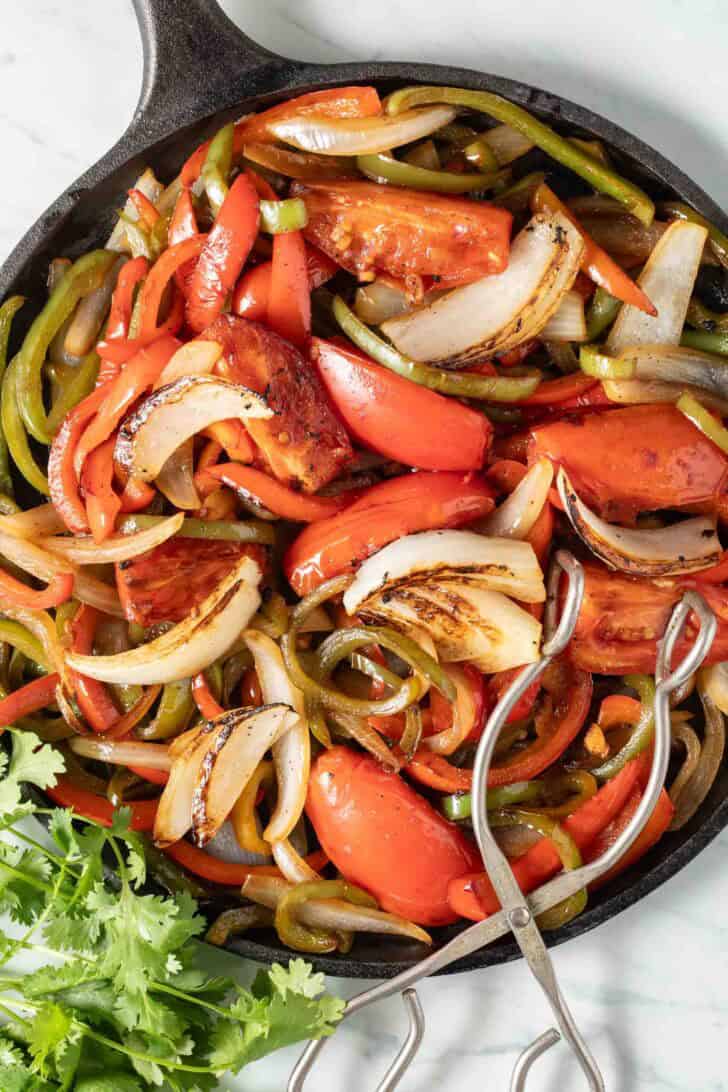 Fajita Vegetables Fajita Vegetables in a cast iron skillet.