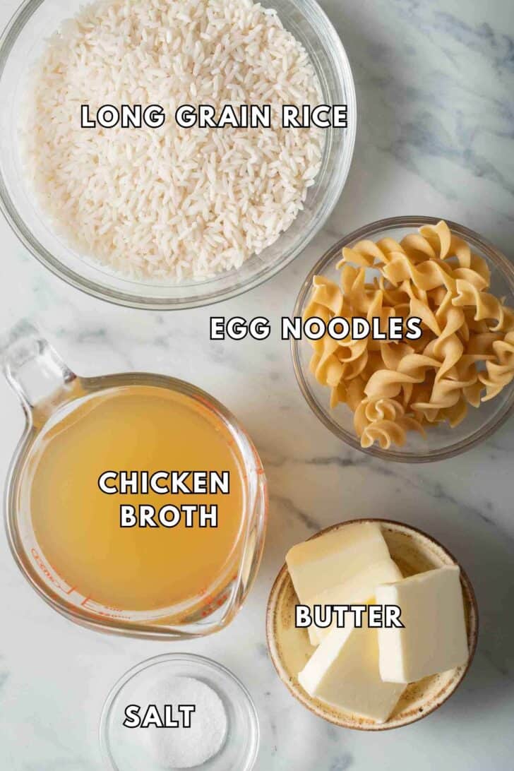 Rice Pilaf Recipe Clear glass bowls filled with rice, egg noodles and chicken broth for rice pilaf recipe.
