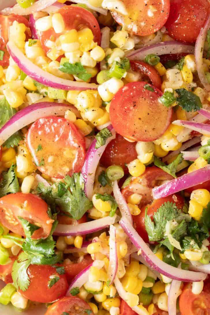 Corn and Tomato Salad Recipe Corn and Tomato Salad in a bowl.