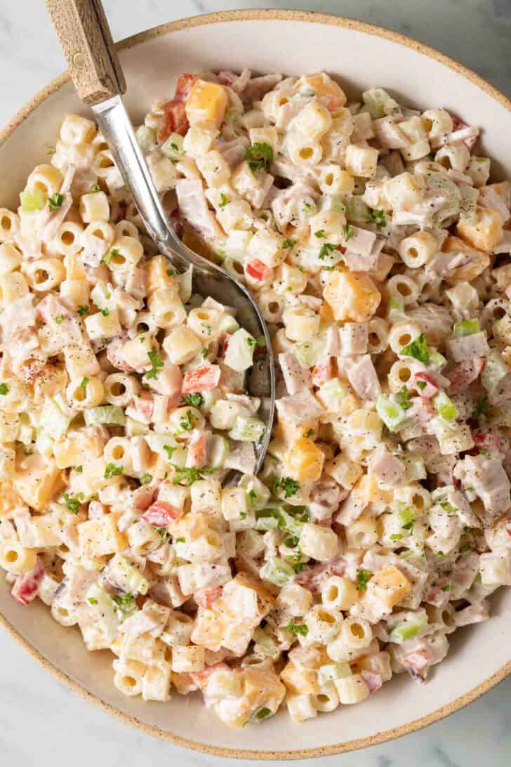 Macaroni Salad with Cheese Macaroni Salad with Cheese in a bowl.