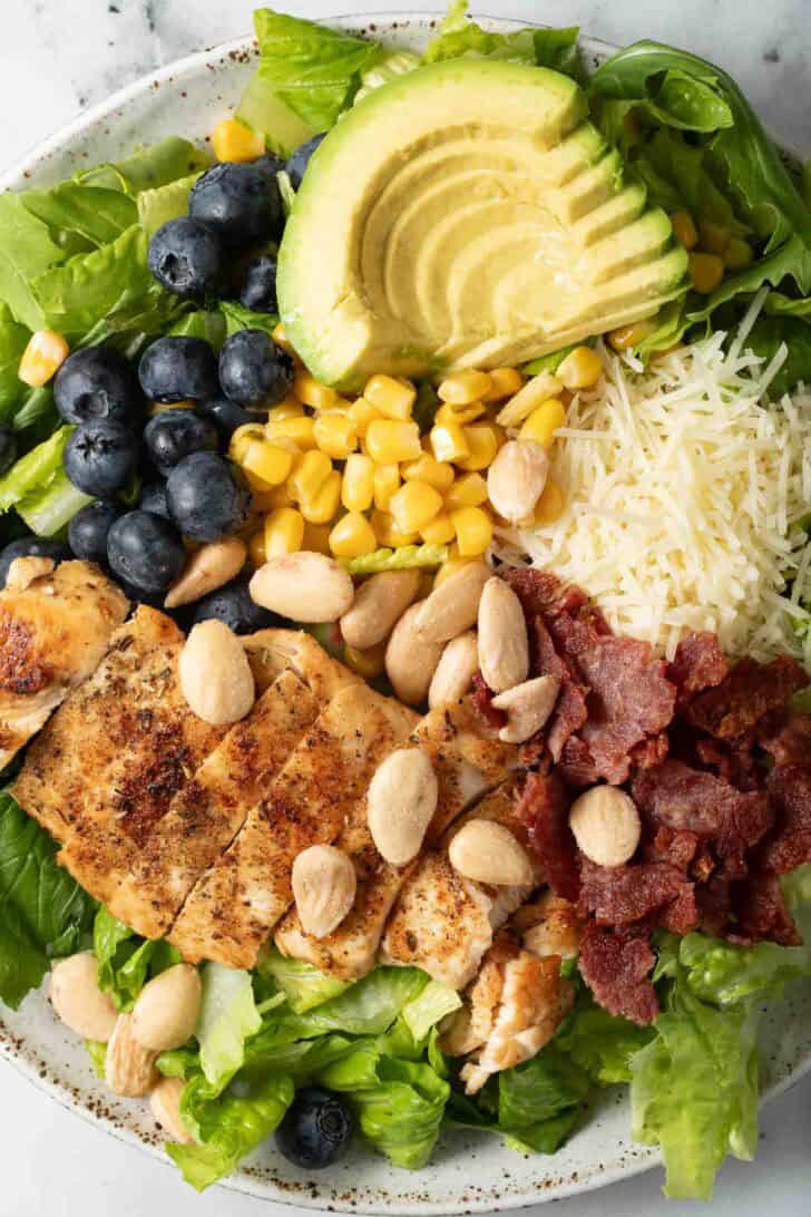Summer Salad with Chicken Summer salad with chicken on a plate.