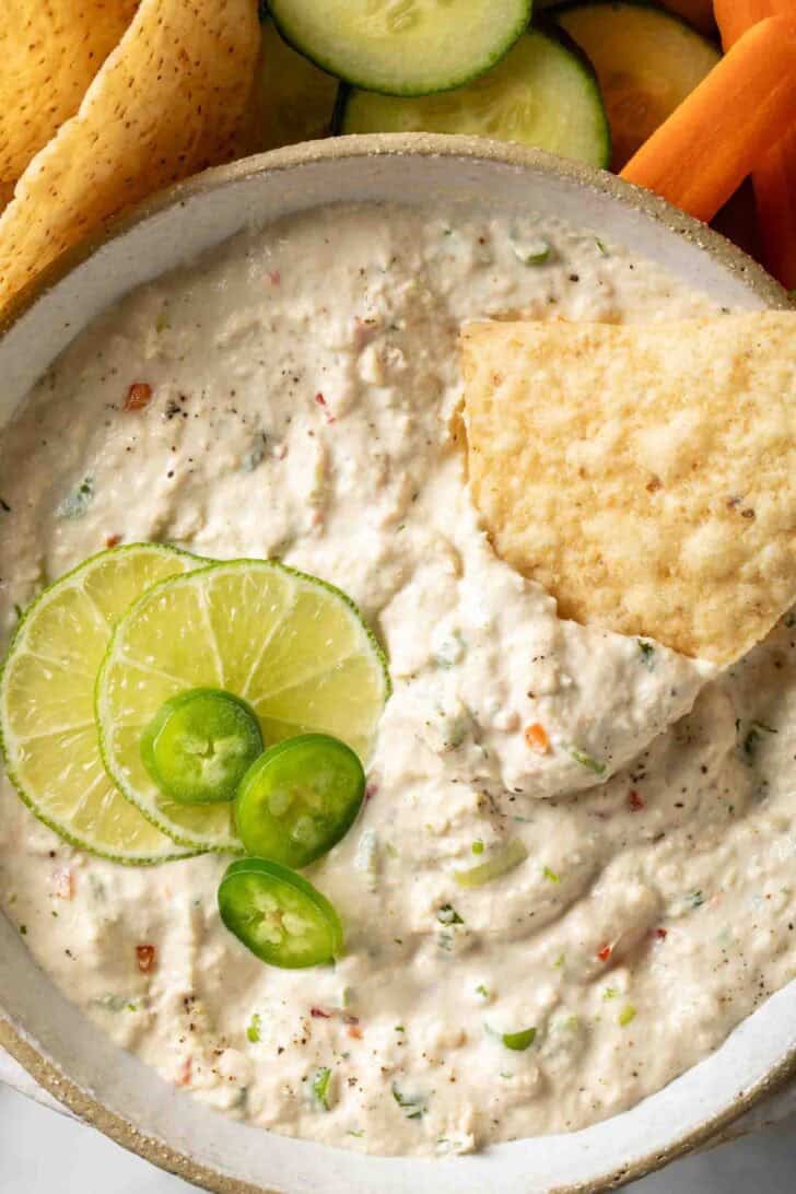 Tuna Dip Tuna Dip in a bowl with a tortilla chip.