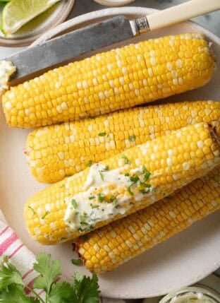 Air Fryer Corn on the Cob on a plate.