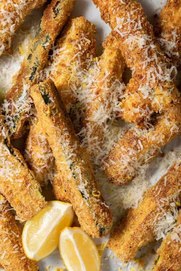 Baked Zucchini Fries Baked Zucchini Fries on a baking dish.