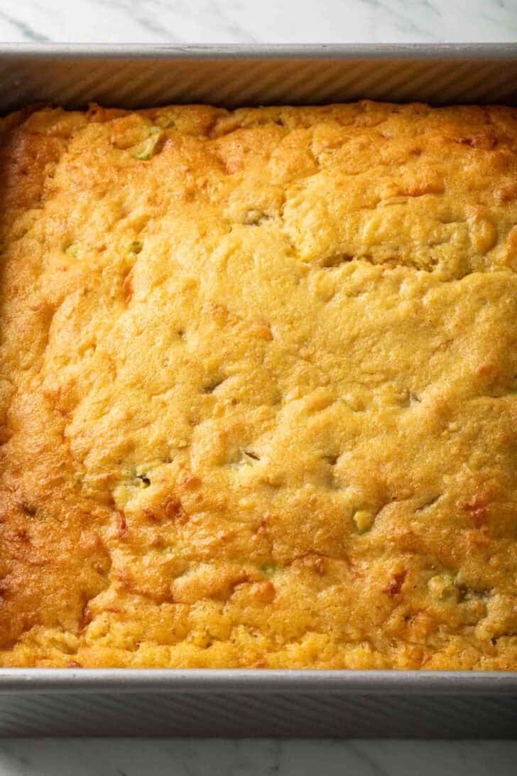Recipe for Mexican Cornbread Mexican Cornbread in a baking pan.