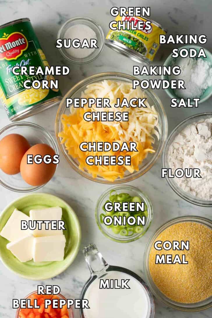Mexican Cornbread Recipe Mexican Cornbread Ingredients, glass bowl of cornmeal, flour, butter, milk.