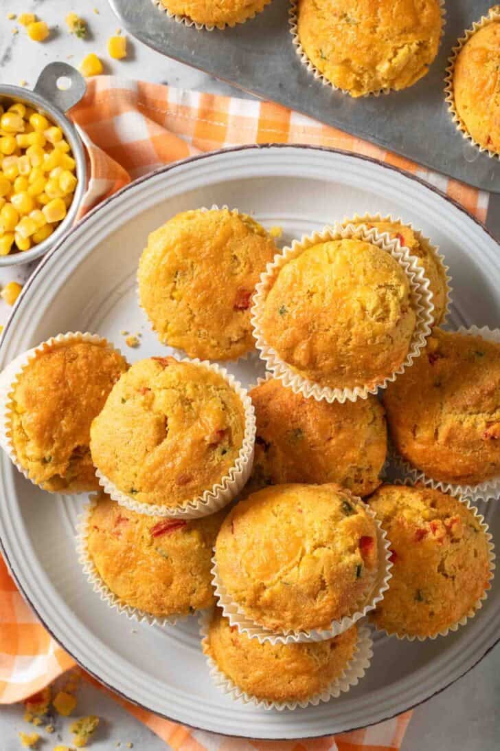 Jalapeno Cornbread Jalapeno Cornbread in muffin cups on a white plate.