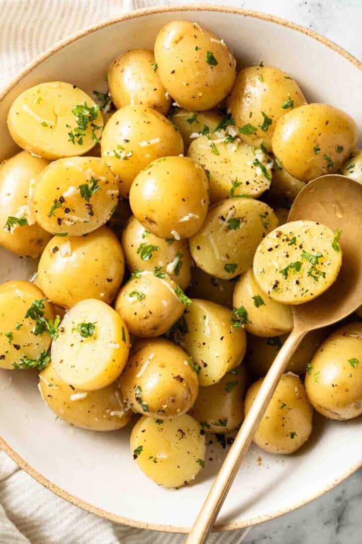 Boiled Potatoes Boiled Potatoes in a bowl with a serving spoon.
