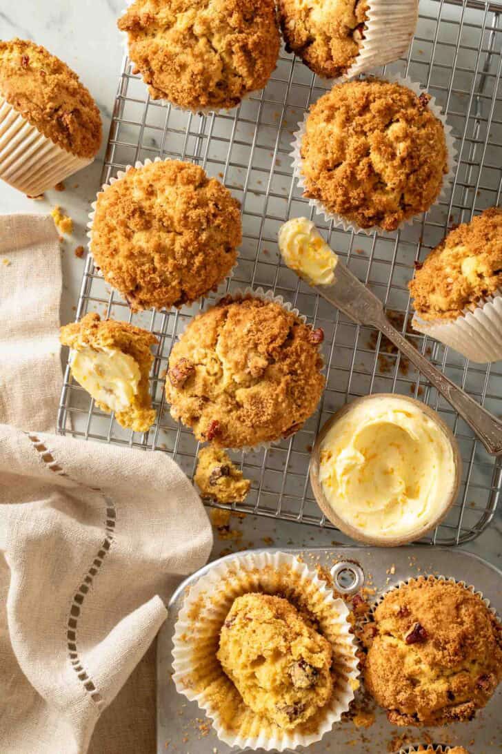 Pumpkin Muffins with Cream Cheese Pumpkin Muffins with Cream Cheese on a wire cooling rack.