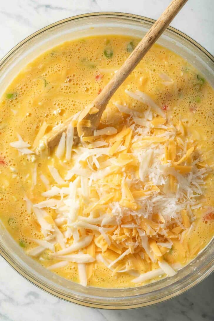 Baked Cottage Cheese Eggs Whisked eggs with cheese for Baked Cottage Cheese Eggs.