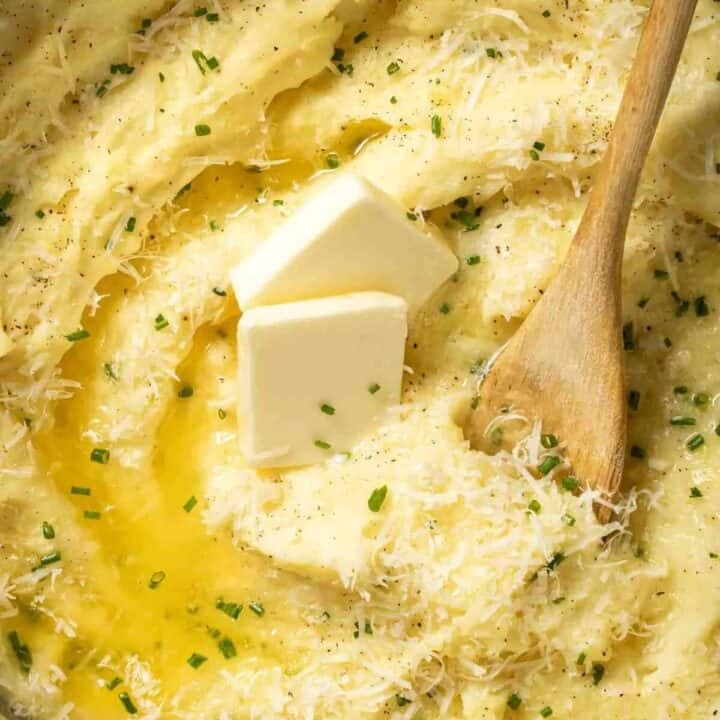 Garlic Parmesan Mashed Potatoes in a stainless steel pot.