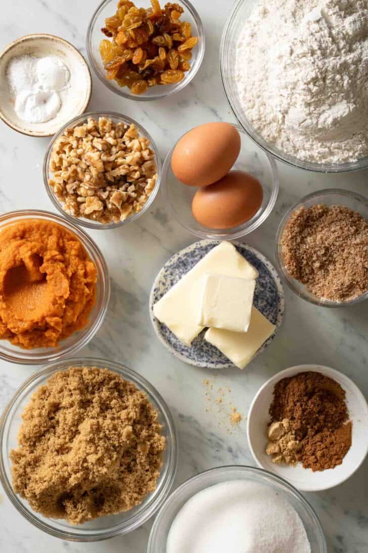 Pumpkin Spice Muffins Recipe Pumpkin Spice Muffins ingredients in clear glass bowls.