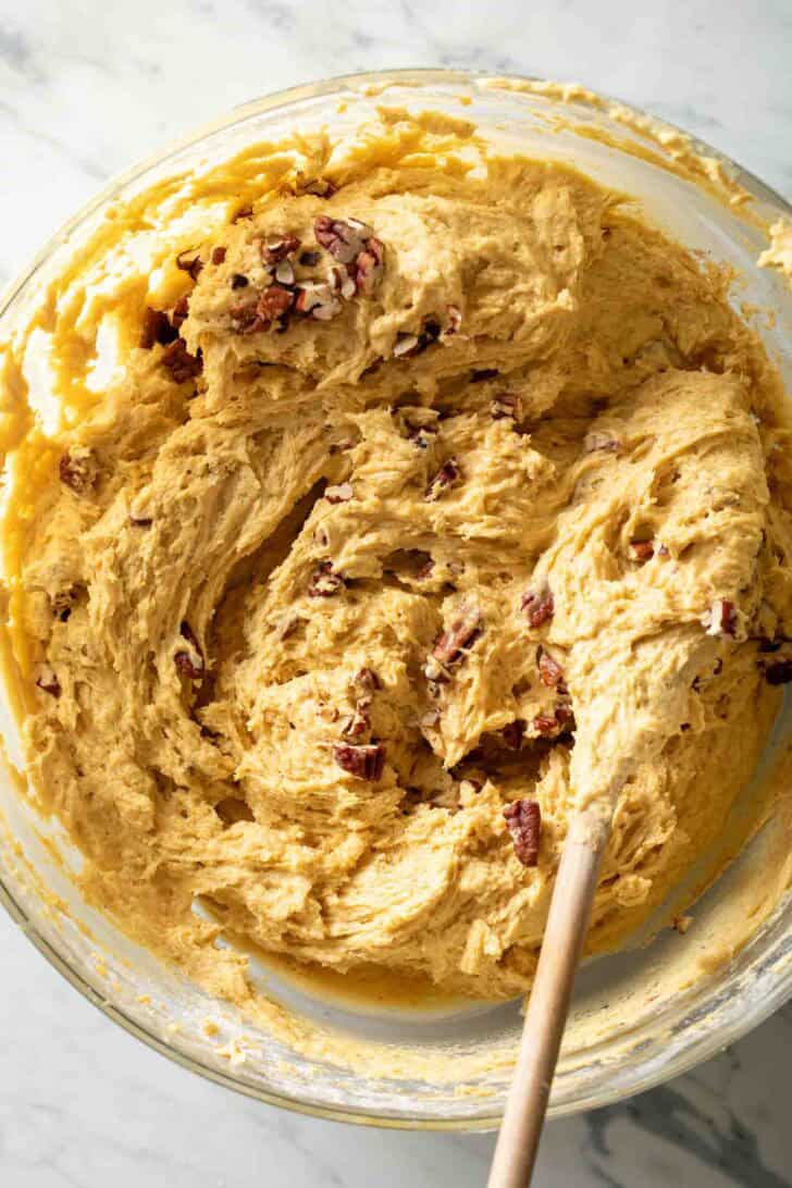 Pumpkin Cream Cheese Muffin Recipe Pumpkin Cream Cheese Muffin batter in a glass bowl.
