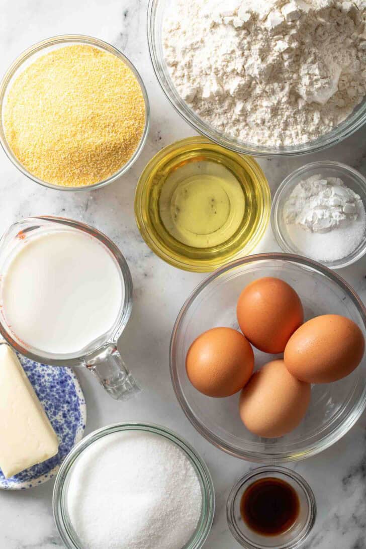 Sweet Cornbread Recipe Ingredients for Sweet Cornbread Recipe in clear glass bowls.