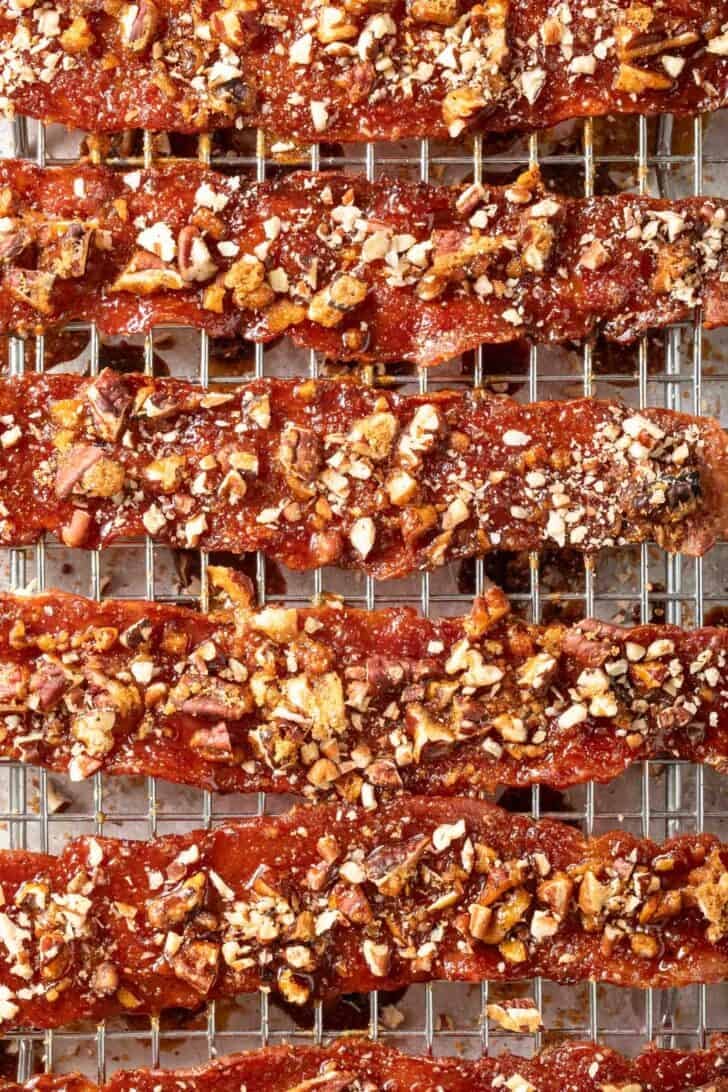Brown Sugar Bacon Recipe Brown Sugar Bacon on a wire cooling rack.