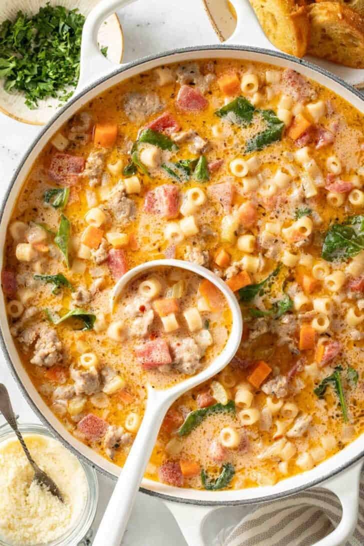 Creamy Parmesan Italian Sausage Soup Creamy Parmesan Italian Sausage Soup in a white pot.