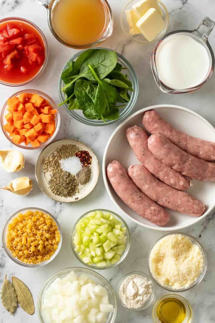 Creamy Parmesan Italian Sausage Soup Recipe Creamy Parmesan Italian Sausage Soup Recipe ingredients in glass bowls.