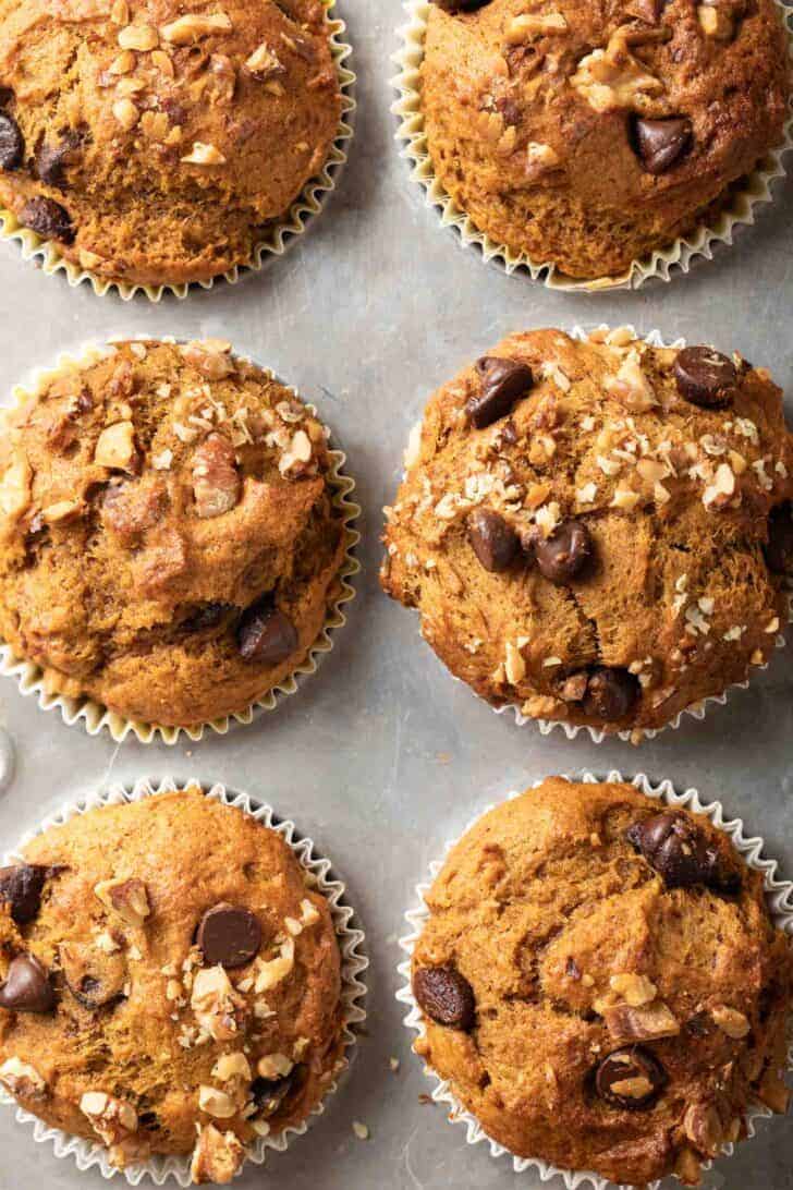 Pumpkin Chocolate Chip Muffins Pumpkin Chocolate Chip Muffins on a muffin tin.