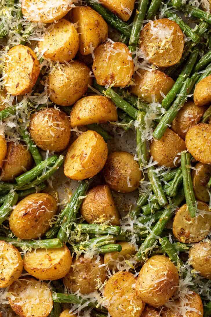 Roasted Green Beans and Potatoes Roasted Green Beans and Potatoes on a baking sheet.