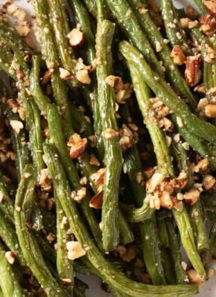 Roasted Green Beans on a white plate.
