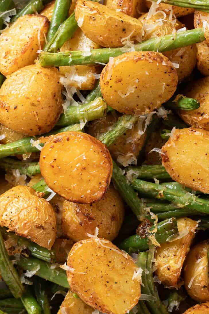 Green Beans and Potatoes Recipe Green Beans and Potatoes on a baking sheet.