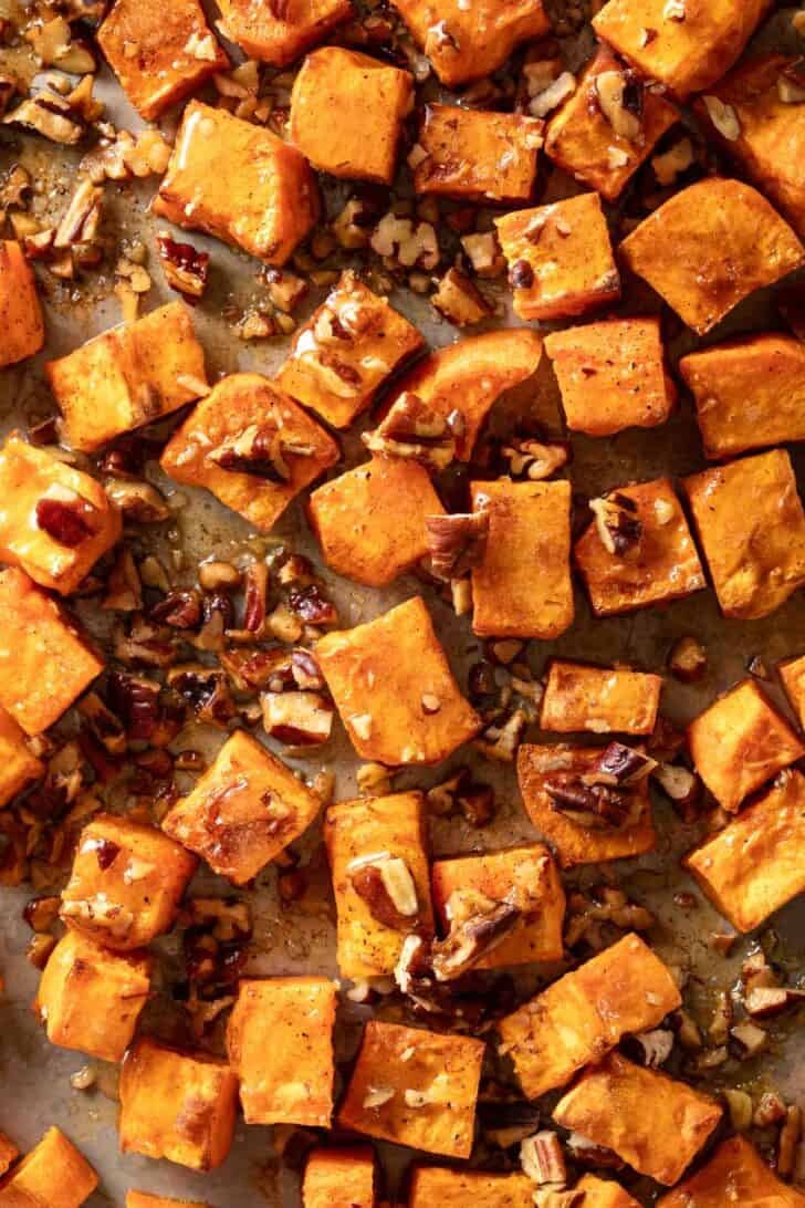 Oven Roasted Sweet Potatoes Oven Roasted Sweet Potatoes on a baking sheet.