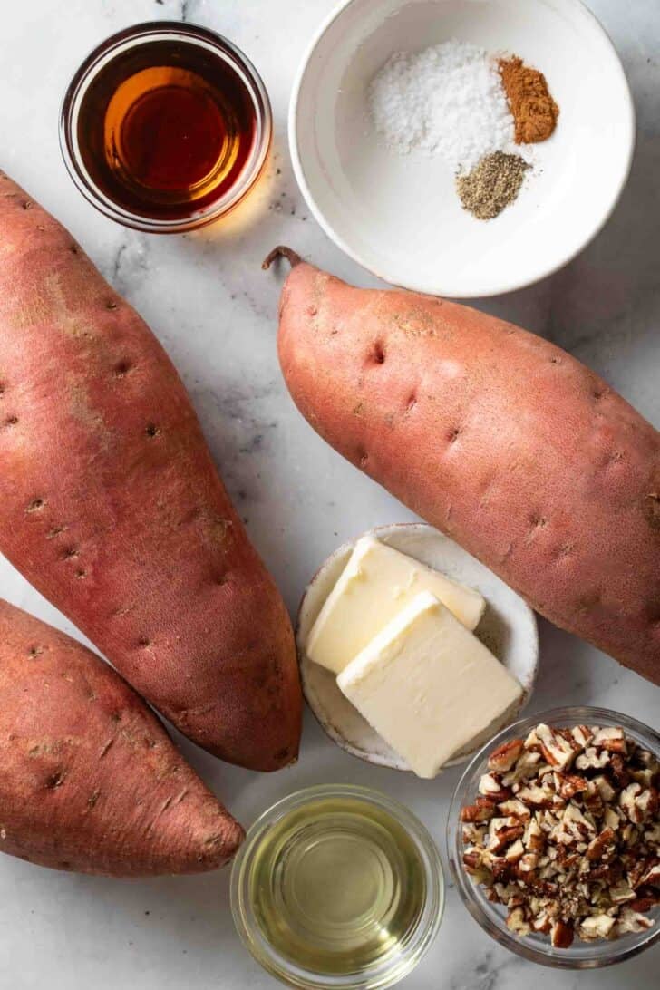 Roasted Sweet Potatoes Recipe Roasted Sweet Potatoes ingredients with pure maple syrup, butter and pecans.