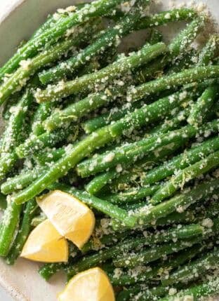Garlic Green Beans on a white plate.