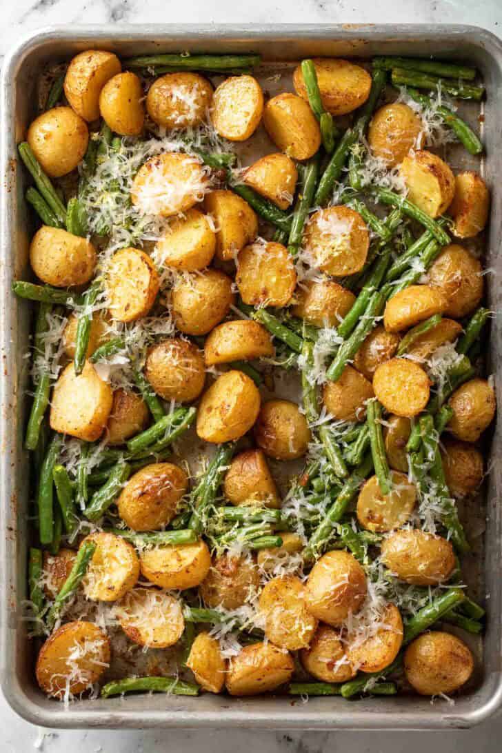 Roasted Green Beans and Potatoes Roasted Green Beans and Potatoes on a baking sheet.