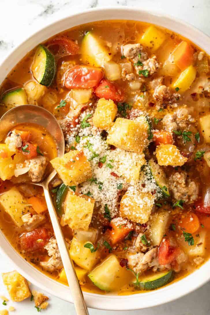 Italian Sausage and Vegetable Soup Italian Sausage and Vegetable Soup in a white bowl.