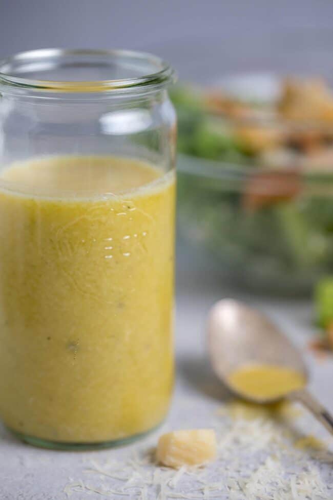 A glass Weck jar filled with vinaigrette.