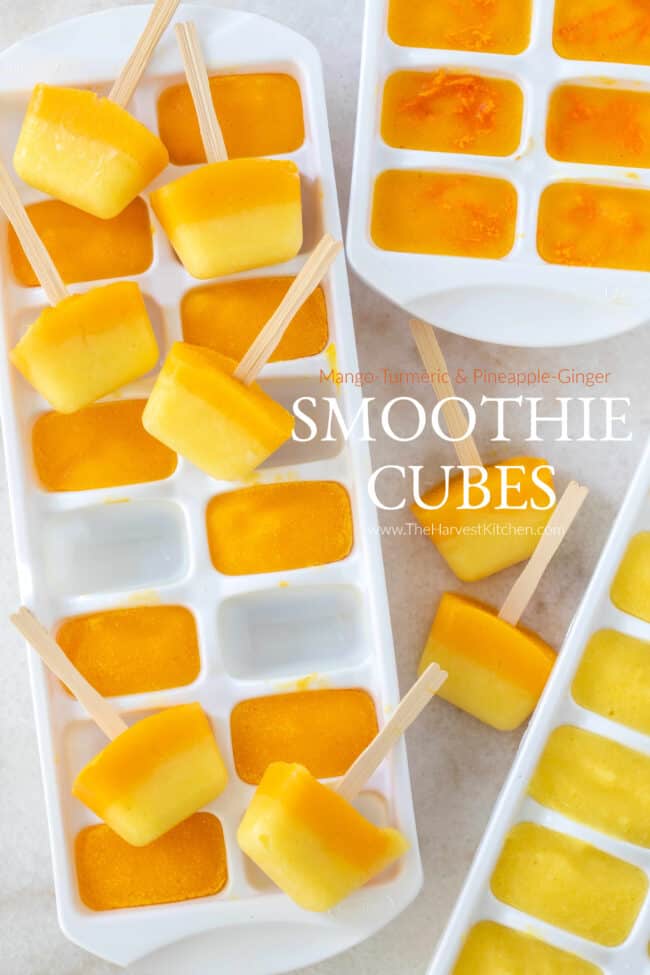 White trays filled with smoothie cubes made with pineapple ginger and mango turmeric.
