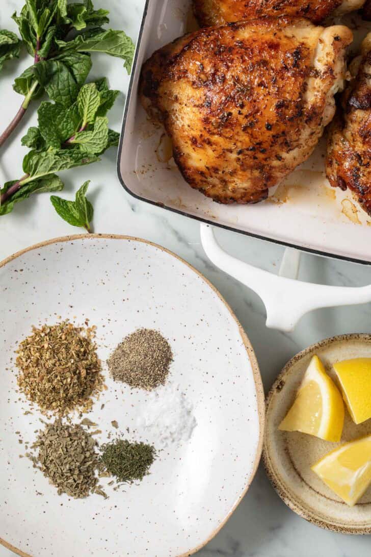 Greek Seasoning Recipe Greek seasoning ingredients in a white dish.